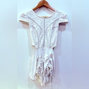 Cap sleeves, side cut outs white romper